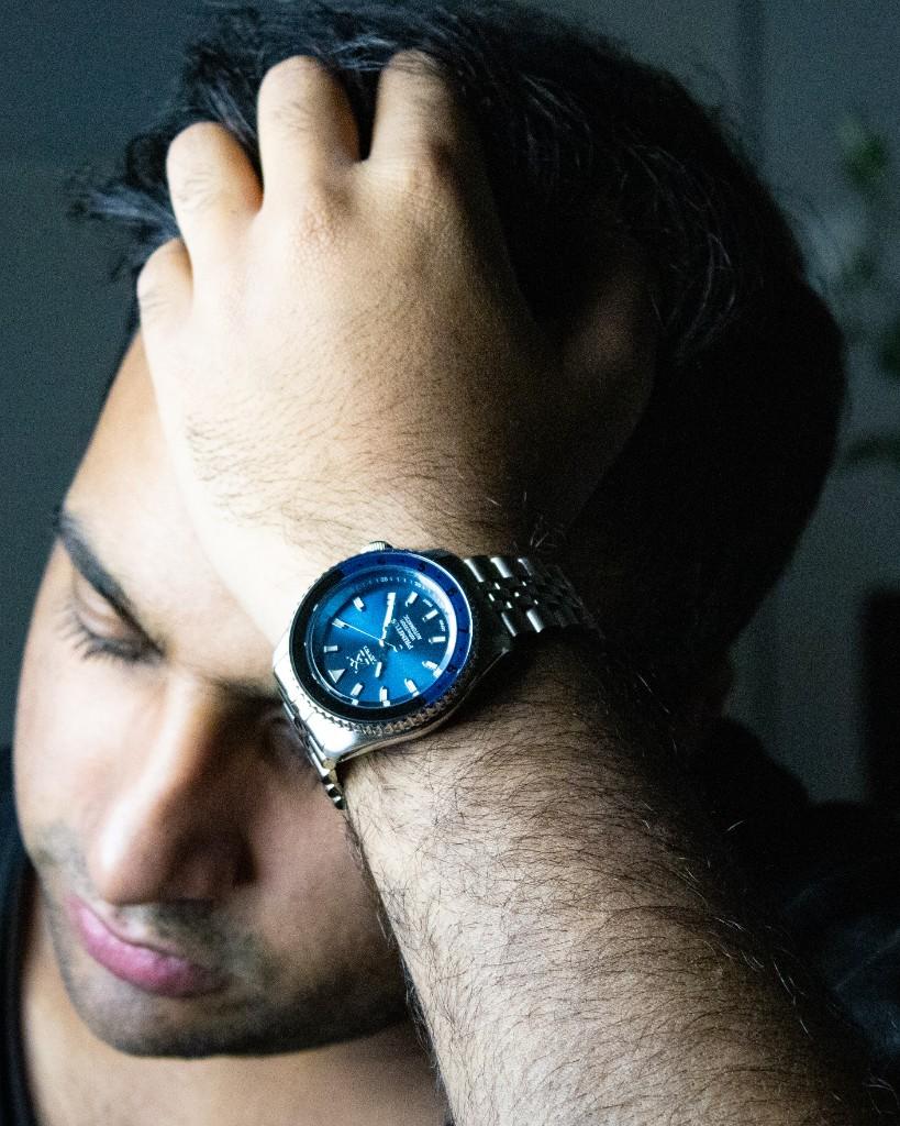 LEXWA PRIMITUS blue dial on wrist — lifestyle portrait